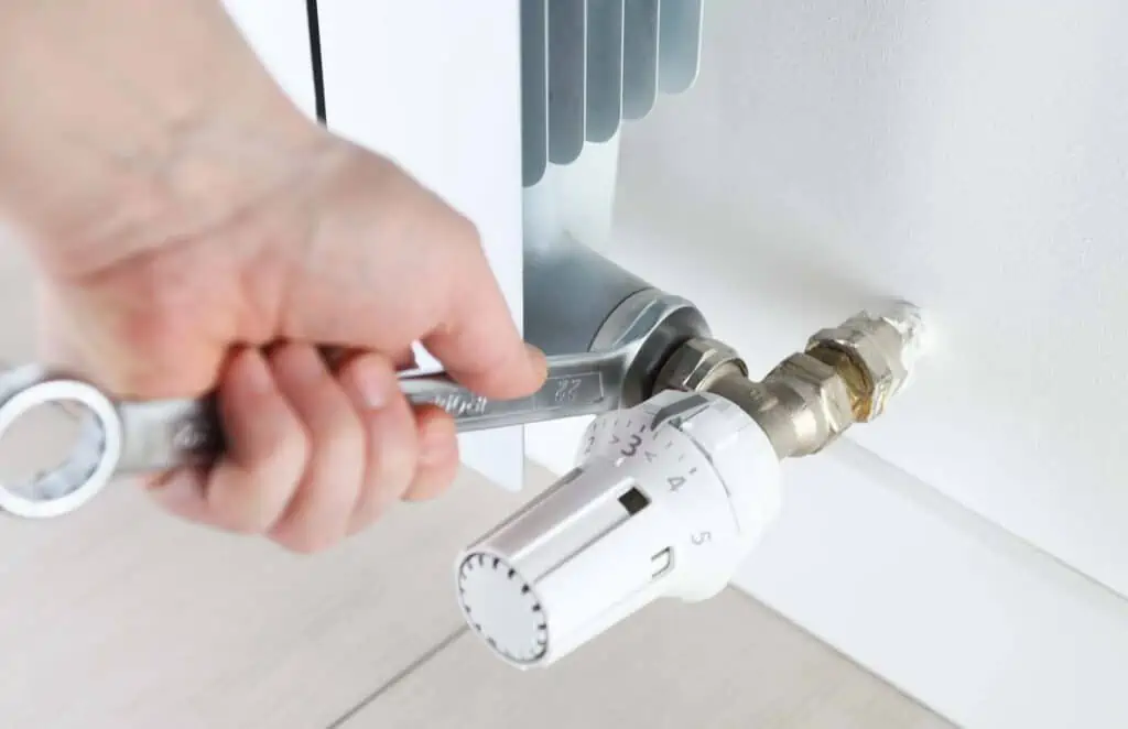 Power flushing removing sludge from a central heating system