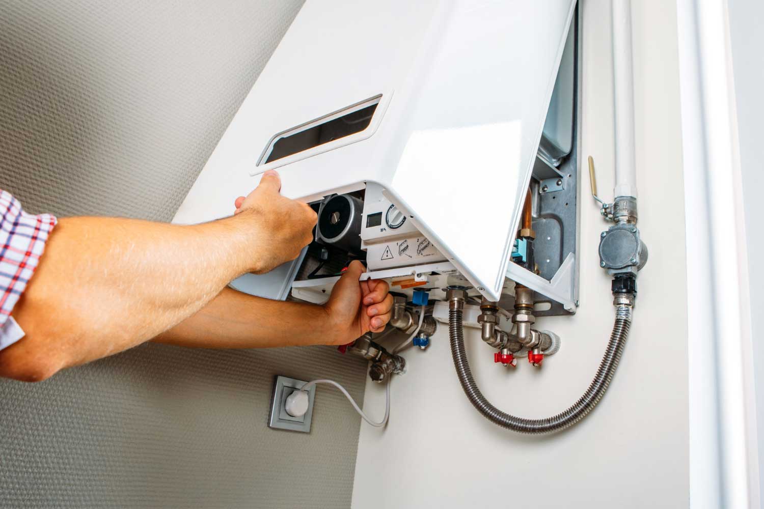 Revolution Gas engineer carrying out a boiler repair